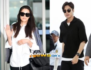 Celebrities greeting fans at the airport.