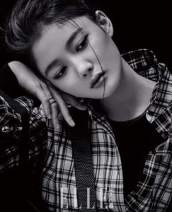 Black and white portrait of a thoughtful woman.