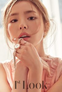 Woman with accessories in soft lighting.