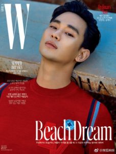 Male model in red sweater, magazine cover.