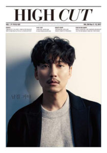 Male portrait on magazine cover.