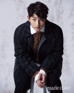 Young man in stylish layered clothing.