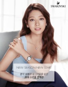 Model displaying Swarovski jewelry collection campaign.