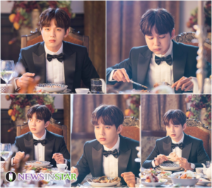 Man in tuxedo dining at an elegant table.