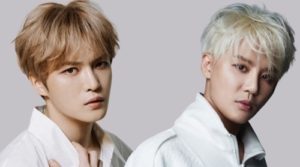 Two young men with stylish hairstyles.