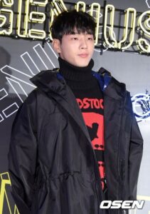 Young man in stylish winter attire.