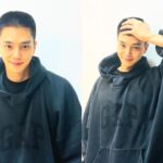 Smiling person in a GAP hoodie outfit.