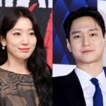 Two people posing at an event.