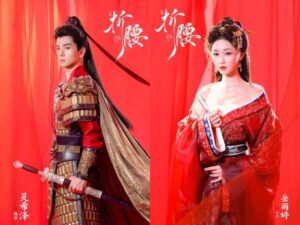 Two people in traditional Chinese attire.