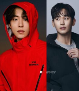 Two men wearing red and black jackets.