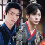 Two men in traditional Asian costumes.