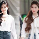 Two women in white blouses outdoors.