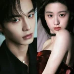 Man and woman posing in elegant attire.