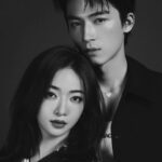 Elegant couple posing in black and white.