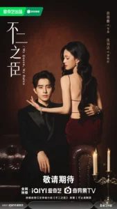 Elegant couple posing in dramatic lighting.